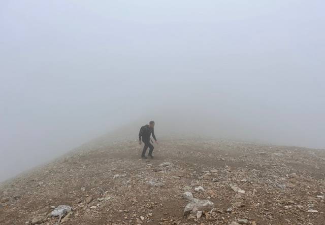 Arjan Samplonius met Sjoerd den Hertog wandelend in de bergen van Livigno