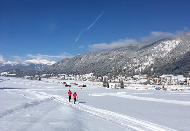 Genieten van de stilte in de witte wereld van Weissensee