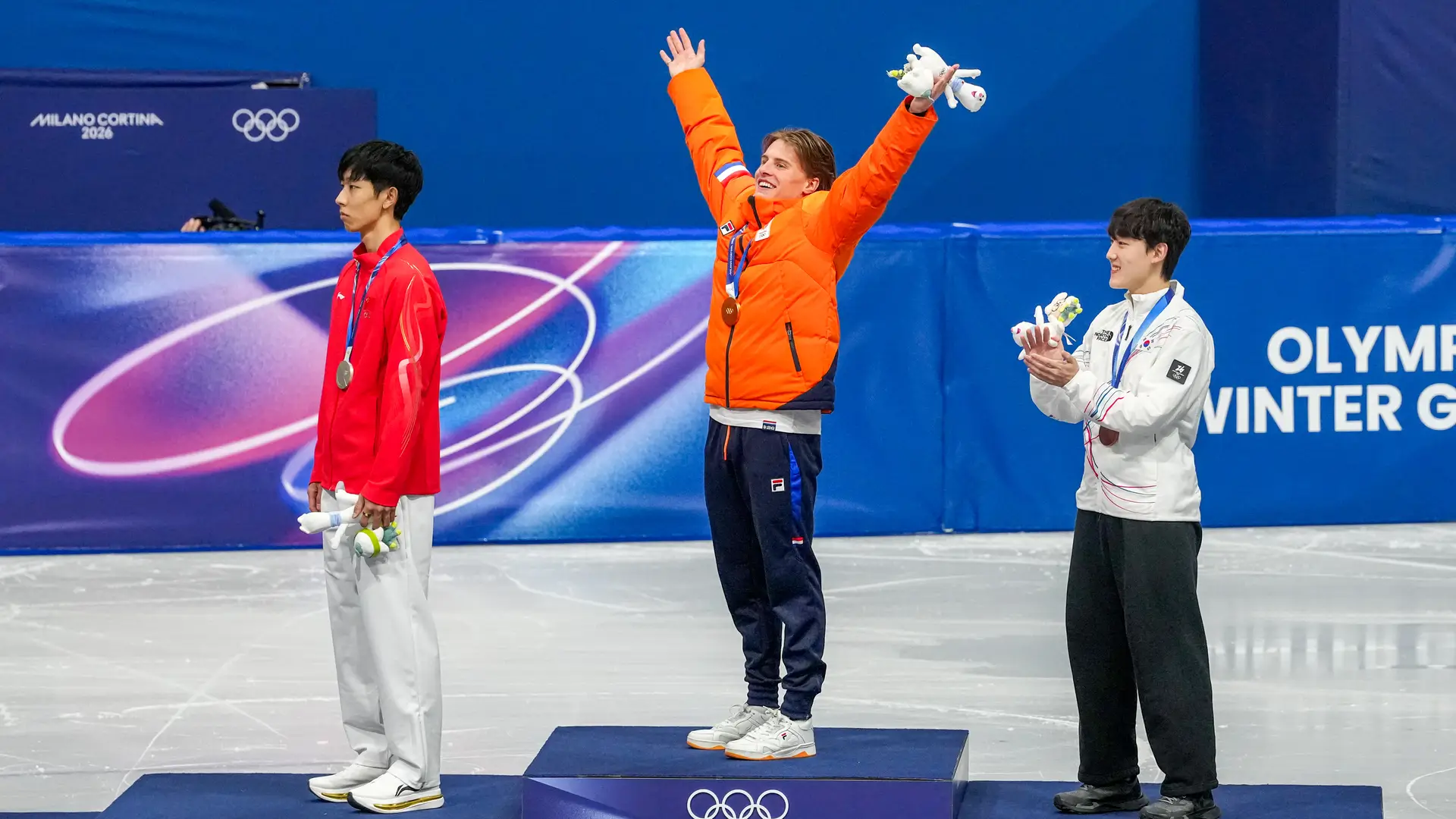 Jens op het podium  1000m OS 2026