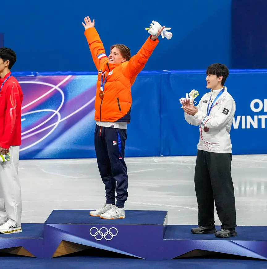 Jens op het podium  1000m OS 2026